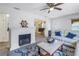 Living room with a decorative fireplace and ship wheel accent at 5609 20Th S Ave, Gulfport, FL 33707