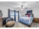 Spacious bedroom with ceiling fan and comfy seating at 5609 20Th S Ave, Gulfport, FL 33707
