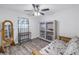 Bedroom with futon, built-in shelving, and mirror at 5609 20Th S Ave, Gulfport, FL 33707