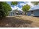Large backyard with detached shed and mature trees at 5609 20Th S Ave, Gulfport, FL 33707