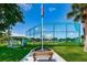 Baseball field with backstop and American flag at 169 Sun Isle Cir # 33, Treasure Island, FL 33706