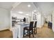 Open concept kitchen with breakfast bar and stainless steel appliances at 36750 Us Highway 19 N # 13202, Palm Harbor, FL 34684
