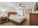 Spacious bedroom with king-size bed and wood furniture at 36750 Us Highway 19 N # 13202, Palm Harbor, FL 34684