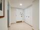 Bright and spacious entryway with tiled floors and coat closet at 36750 Us Highway 19 N # 13202, Palm Harbor, FL 34684