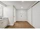 Carpeted entryway with doors to bedrooms and bath at 36750 Us Highway 19 N # 13202, Palm Harbor, FL 34684