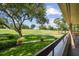 Balcony overlooking a lush golf course at 36750 Us Highway 19 N # 13202, Palm Harbor, FL 34684