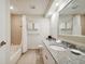 Bathroom with granite vanity, mirror, and bathtub at 36750 Us Highway 19 N # 13202, Palm Harbor, FL 34684