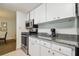 Modern kitchen with stainless steel appliances and granite countertops at 36750 Us Highway 19 N # 13202, Palm Harbor, FL 34684