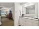 Small bathroom with granite vanity and coffee maker at 36750 Us Highway 19 N # 13202, Palm Harbor, FL 34684