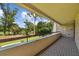 Spacious balcony overlooking the lush green golf course at 36750 Us Highway 19 N # 13202, Palm Harbor, FL 34684