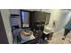 Bathroom featuring dual vessel sinks with modern fixtures and ample cabinet space at 2312 22Nd Sw Ave, Largo, FL 33774
