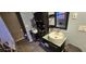 Bathroom showcasing a modern vanity with storage and tile flooring at 2312 22Nd Sw Ave, Largo, FL 33774