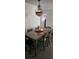 Traditional dining room featuring an overhead light fixture, wooden table, and seating at 2312 22Nd Sw Ave, Largo, FL 33774