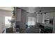 Bright kitchen featuring granite countertops, stainless steel appliances, and a breakfast bar with seating at 2312 22Nd Sw Ave, Largo, FL 33774