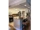 Kitchen features granite countertops and breakfast bar at 36750 Us Highway 19 N # 21-302, Palm Harbor, FL 34684