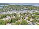 An aerial view of a waterfront residential community with homes along canals and access to the open water at 131 Pennsylvania Ave, Palm Harbor, FL 34683