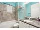 Neutral bathroom with granite countertop, tiled walls and updated fixtures at 131 Pennsylvania Ave, Palm Harbor, FL 34683