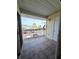 Outdoor balcony featuring tile flooring and a beautiful neighborhood view at 6802 Stones Throw N Cir # 14206, St Petersburg, FL 33710