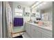Clean bathroom with white vanity and shower/tub at 4936 Mineola Pl, Palm Harbor, FL 34684