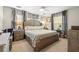 Spacious bedroom with large bed and wood furniture at 4936 Mineola Pl, Palm Harbor, FL 34684