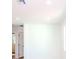 Clean and spacious hallway with white walls and doors at 9197 79Th Ave, Seminole, FL 33777