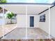Covered patio with concrete flooring and access to backyard at 9197 79Th Ave, Seminole, FL 33777