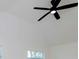 Bright bedroom with ceiling fan and window at 9197 79Th Ave, Seminole, FL 33777