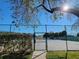 Well maintained tennis court with gated access at 6802 Stones Throw N Cir # 14206, St Petersburg, FL 33710