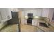 Modern kitchen with granite countertops and stainless steel appliances at 2201 Bay Club Cir, Tampa, FL 33607