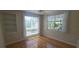Spacious bedroom with hardwood floors and large windows at 2201 Bay Club Cir, Tampa, FL 33607