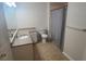 Updated bathroom with granite vanity and tiled floors at 2201 Bay Club Cir, Tampa, FL 33607