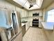 Efficient kitchen with stainless steel appliances and ample cabinet space at 100 Pierce St # 703, Clearwater, FL 33756