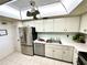 Galley kitchen with stainless steel appliances at 100 Pierce St # 703, Clearwater, FL 33756