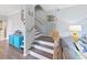 Modern staircase with light wood treads at 577 Vista Trail Ct, Palm Harbor, FL 34683