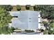 Overhead view of the property, showcasing its roofline and private patio at 577 Vista Trail Ct, Palm Harbor, FL 34683