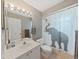 Simple bathroom with shower/tub combo and single vanity at 577 Vista Trail Ct, Palm Harbor, FL 34683