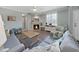 Cozy living room with a fireplace and hardwood floors at 577 Vista Trail Ct, Palm Harbor, FL 34683
