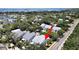 Aerial view of a waterfront community, showcasing the property's location and surrounding homes at 577 Vista Trail Ct, Palm Harbor, FL 34683