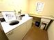 Shared laundry room with washer, dryer, and sink at 100 Pierce St # 703, Clearwater, FL 33756