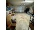 Spacious garage with ample storage shelving at 14580 Wake Robin Dr, Brooksville, FL 34604