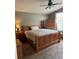 Spacious bedroom with wooden furniture and carpeted floor at 14580 Wake Robin Dr, Brooksville, FL 34604
