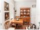 Charming dining area featuring a wooden hutch and table, perfect for Gathering meals at 14580 Wake Robin Dr, Brooksville, FL 34604
