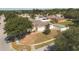 Aerial view of a residential area showing houses and streets at 14580 Wake Robin Dr, Brooksville, FL 34604