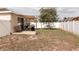 Large backyard with a grassy area and a patio at 14580 Wake Robin Dr, Brooksville, FL 34604