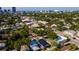 Expansive aerial view of the community with lush greenery and a city skyline at 316 11Th N Ave, St Petersburg, FL 33701