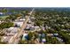 Charming neighborhood view showcasing a blend of commercial and residential buildings nestled among lush trees in St. Petersburg at 316 11Th N Ave, St Petersburg, FL 33701
