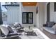 Covered patio with elegant seating and view of lush outdoor landscape at 316 11Th N Ave, St Petersburg, FL 33701