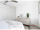 Bright bedroom features a ceiling fan, natural light from the window and white decor at 316 11Th N Ave, St Petersburg, FL 33701