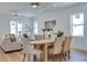 Open-concept living and dining area with modern furnishings and plenty of natural light at 316 11Th N Ave, St Petersburg, FL 33701