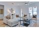 Spacious living room featuring hardwood floors, neutral decor, and a comfortable seating area at 316 11Th N Ave, St Petersburg, FL 33701